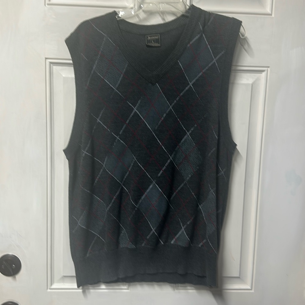 Large sweater vest in charcoal gray in new condition